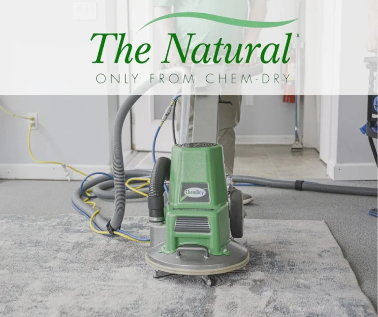 The Natural, only from Chem-Dry, with a Chem-Dry machine on a rug